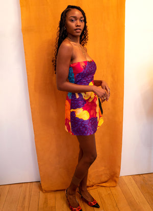 
                  
                    load image into gallery viewer, A dress for Maddy on Euphoria: strapless tube top upper with perfect mini skirt, sustainable and upcycled using vintage fabric. Fruit print.
                  
                