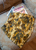 High-waisted A-line mini skirt sustainably made using upcycled vintage fabric. Harvest print (very Lisa Says Gah!)