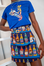 BEER PRINT HIGH-RISE A-LINE MINI SKIRT. Totally sustainable. Upcycled using vintage fabrics with fun prints. 