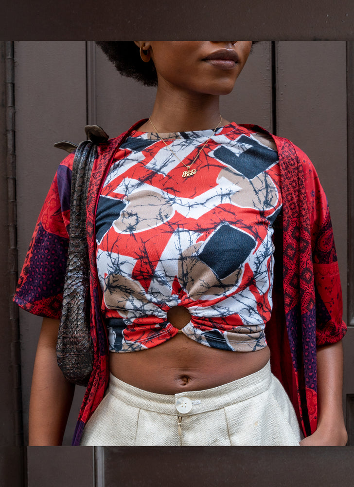 
                  
                    load image into gallery viewer, Perfect sustainable spring outfit. Upcycled gold raw silk shorts - high-waisted, wide-leg, and short-length. Styled on Black model with red tee and matching scrunchie.
                  
                