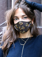 Vintage-fabric face masks, as seen in NY Mag, Zoe Report, Man Repeller, and more. Sustainably upcycled locally in NY! Comfortable cottons, luxe silks, psychedelic prints, designer logos, and more. Matching scrunchies available.