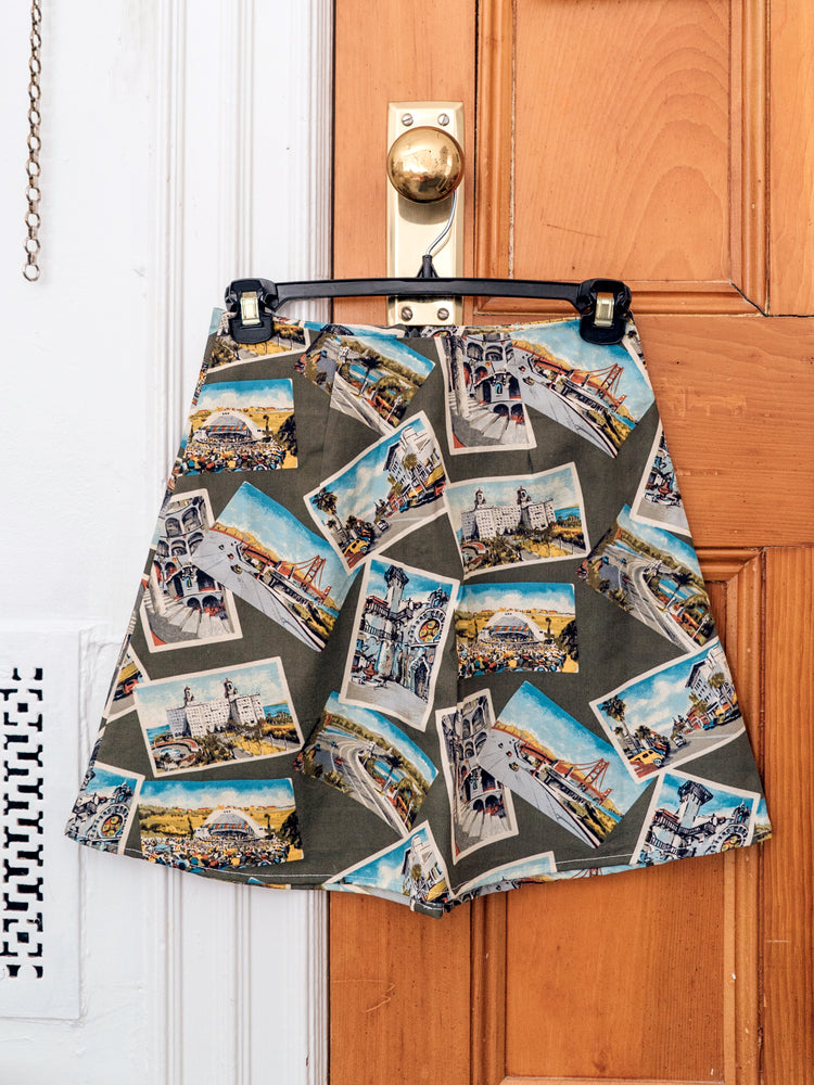POSTCARD MINI SKIRT -- A-line, high-waisted, and perfect fitting! Style with any tee and kitten heels for the perfect summer outfit.