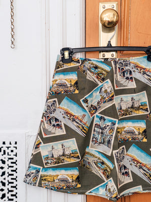 
                  
                    load image into gallery viewer, POSTCARD MINI SKIRT -- A-line, high-waisted, and perfect fitting! Style with any tee and kitten heels for the perfect summer outfit.
                  
                