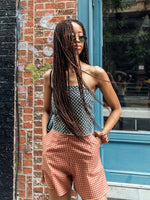 Perfect summer shorts - high-waisted, wide-leg, and short-length. Modelled with a scarf top.