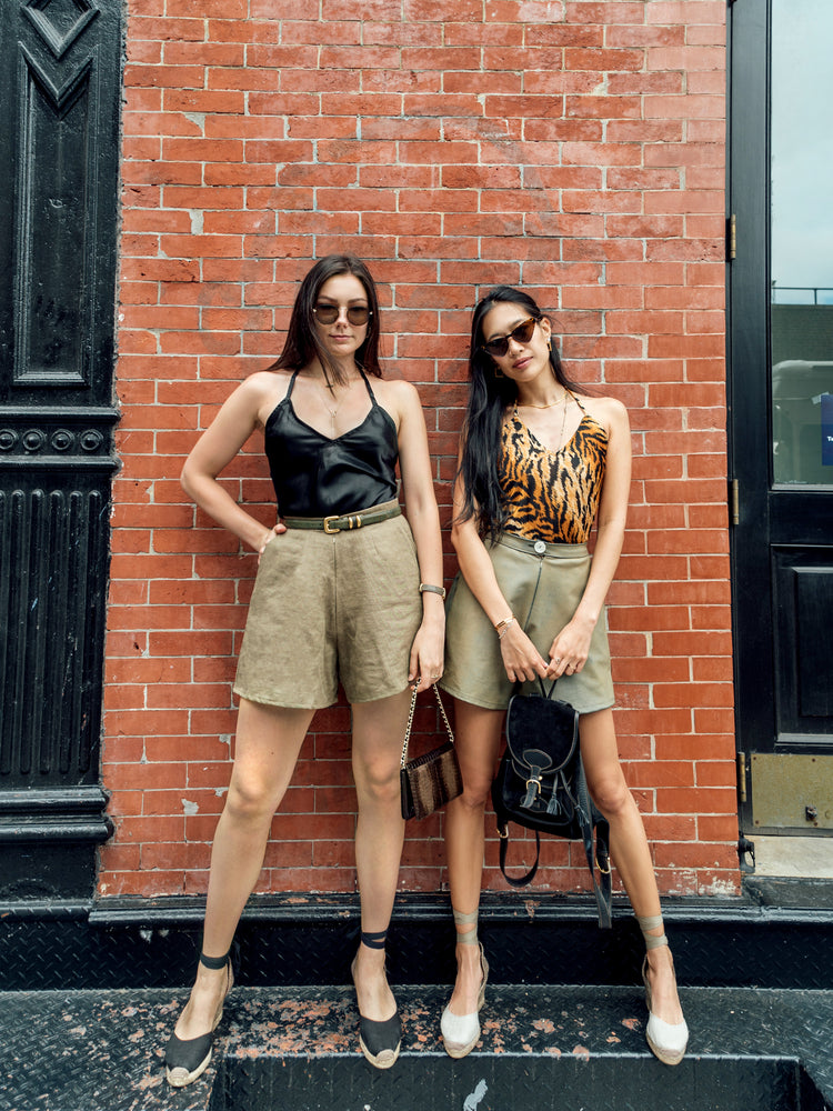 
                  
                    load image into gallery viewer, Upcycled linen, high-waisted, wide-leg shorts. Sustainably made of vintage fabric. Cutest summer outfits! Two models wearing the same shorts.
                  
                