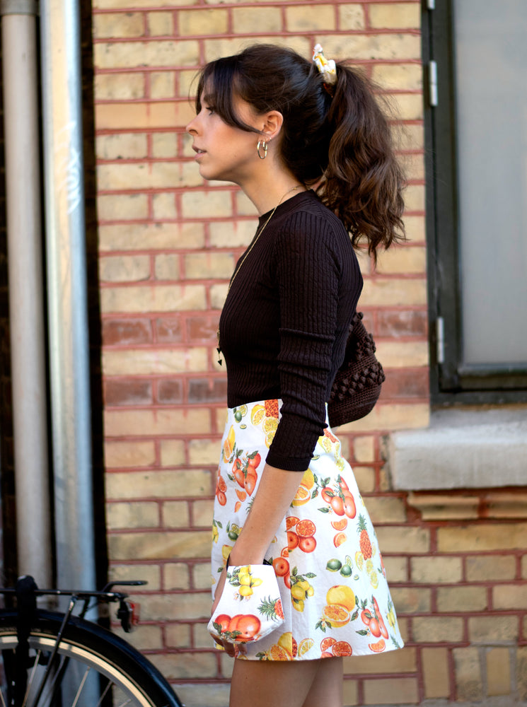 
                  
                    load image into gallery viewer, Citrus mini skirt. A-line, high-waisted, and totally sustainable. Shot in Copenhagen.
                  
                