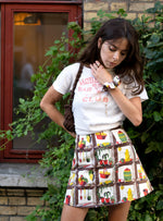 Cute summer outfit: Our cult-fav mini skirt: A-line, high-rise, and made of vintage fabric. Kitche print, very 1950s!!